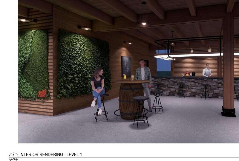 Downstairs bar with stone bar, barrel high-tops, and a living plant wall
